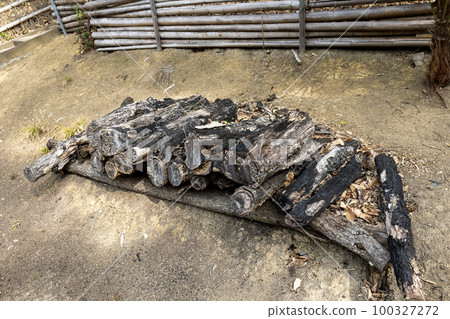 Dilapidated logs piled up Dilapidated logs piled up 100327272