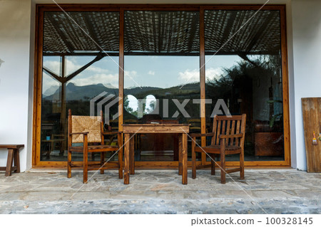 Village veranda or porchway in Cyprus. Table and chairs 100328145