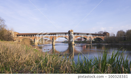Low angle view of Ponte Coperto Pavia (covered bridge) at sunny day Low angle view of Ponte Coperto Pavia (covered bridge) at sunny day 100328381