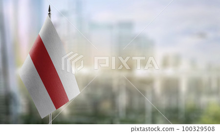A small Belarus flag on an abstract blurry background A small Belarus flag on an abstract blurry background 100329508