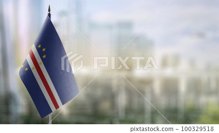 Small flags of the Cape Verde on an abstract blurry background 100329518