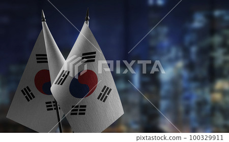 Small flags of the South Korean on an abstract blurry background 100329911