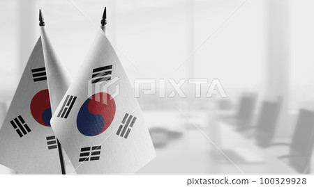 Small flags of the South Korean on an abstract blurry background Small flags of the South Korean on an abstract blurry background 100329928