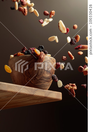 Flying dried fruits and nuts. Flying dried fruits and nuts. 100330416