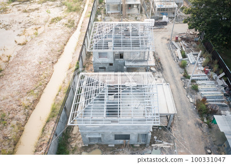 Home or house under construction in aerial view. 100331047