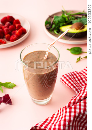 Smoothies made of strawberries, banana and herbs Smoothies made of strawberries, banana and herbs 100333202
