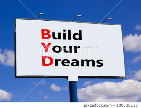 BYD build your dreams symbol. Concept words BYD build your dreams on big white billboard against beautiful blue sky background. Clouds. Business and BYD build your dreams concept. Copy space. BYD build your dreams symbol. Concept words BYD build your dreams on big white billboard against beautiful blue sky background. Clouds. Business and BYD build your dreams concept. Copy space. 100336118