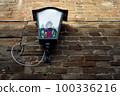 Vintage sreet lamp with a beer brewery sign 100336216