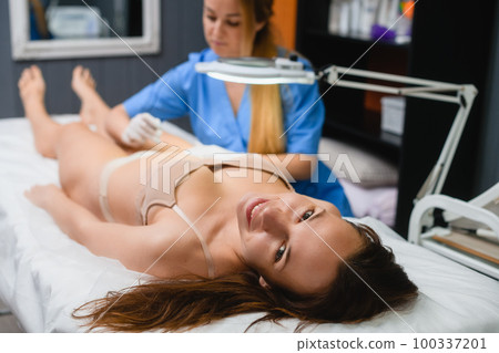 Happy client at electrolysis salon hair removal Happy client at electrolysis salon hair removal 100337201