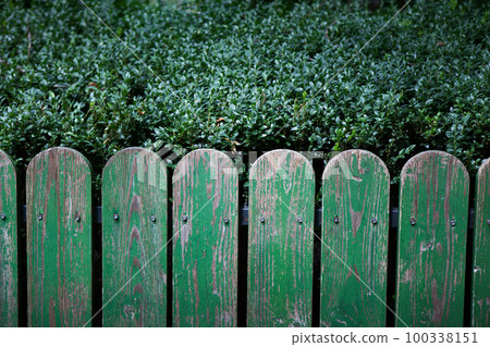 The fence of the park must be repainted The fence of the park must be repainted 100338151