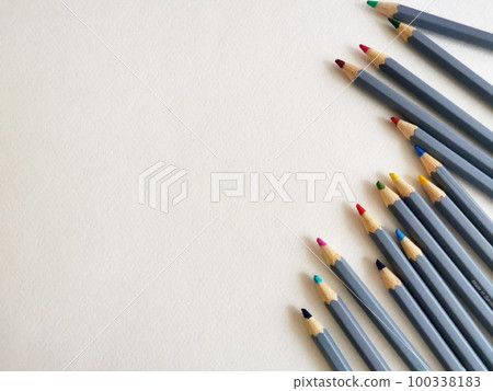 Colored pencils background. Color pencils on white background. 100338183