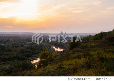 Sunset over Ivano Frankivsk city in Ukraine Sunset over Ivano Frankivsk city in Ukraine 100341528