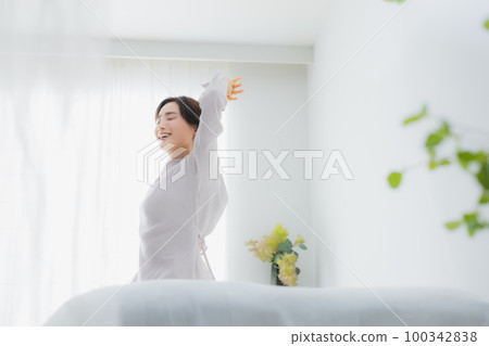 The woman in the bedroom The woman in the bedroom 100342838