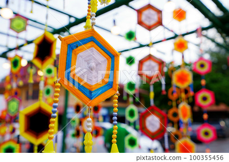 Artifacts made from colored silk threads to decorate buildings 100355456