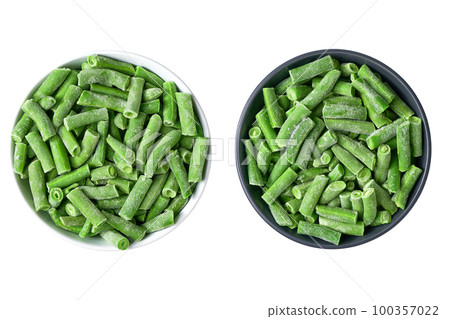 frozen green beans in a black and white ceramic plate isolated on white background, top view. frozen green beans in a black and white ceramic plate isolated on white background, top view. 100357022