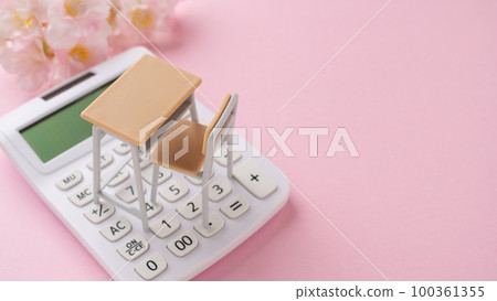 School desk, calculator and cherry blossoms tuition image School desk, calculator and cherry blossoms tuition image 100361355