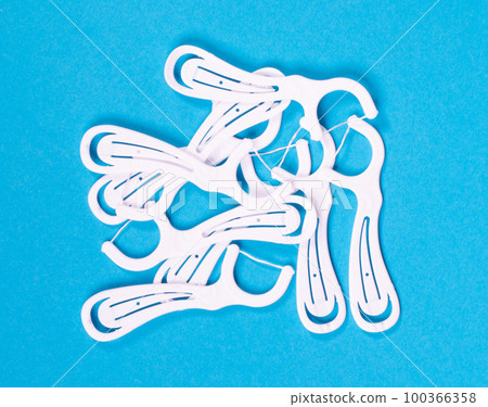 White toothpicks with floss isolated with clipping path 100366358