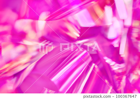 bright neon pink, magenta, orange holographic metallic foil festive background bright neon pink, magenta, orange holographic metallic foil festive background 100367647