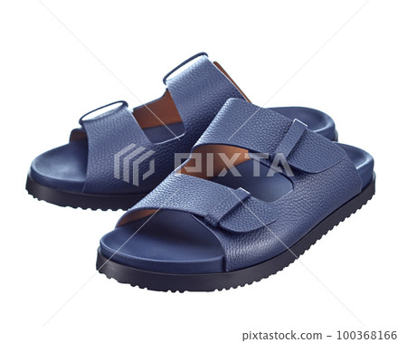 Beautiful pair of blue leather flip-flops with two straps isolated on a white background. Hit of the season. 100368166