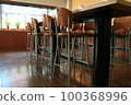 A long table and many chairs 100368996
