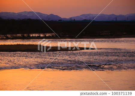 Kitakami City, Iwate Prefecture, Kitakami city area at sunset Kitakami City, Iwate Prefecture, Kitakami city area at sunset 100371139