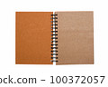 Notebook, with place for your image, text or corporate identity details. Spiral notepad on a table. 100372057