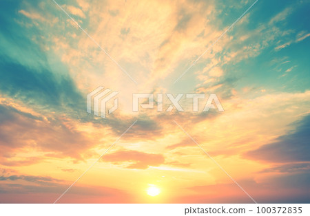 Colorful cloudy sky at sunset. Gradient color. Sky texture. Abstract nature background 100372835
