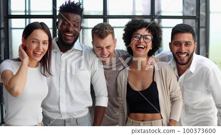 Smiling professional business leaders and employees group team portrait 100373600