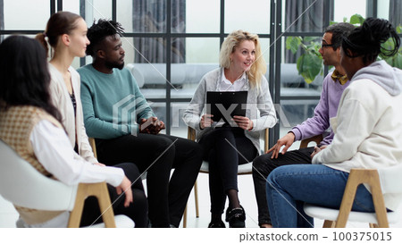 business people attending a seminar in board room business people attending a seminar in board room 100375015