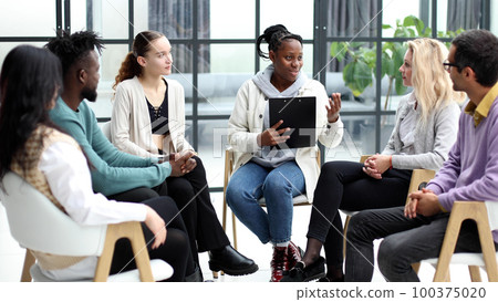Executive Team Listening to Contrary Views from Colleague 100375020