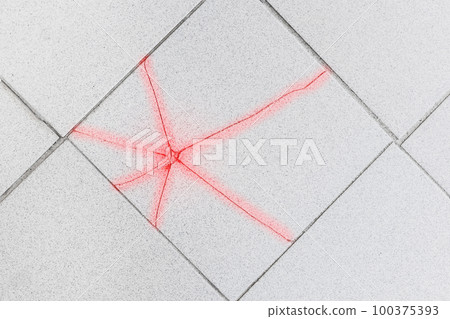 Gray cracked tile repair broken floor background, renovation concept Gray cracked tile repair broken floor background, renovation concept 100375393
