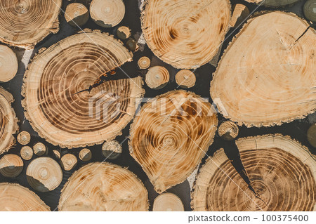 Annual wooden rings decorative pattern interior wall texture decor wood style design abstract background Annual wooden rings decorative pattern interior wall texture decor wood style design abstract background 100375400