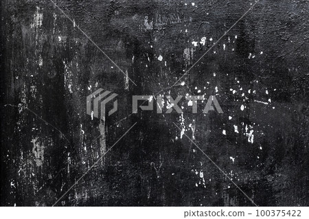 Old black grunge wall texture with white background paint stains worn weathered messy Old black grunge wall texture with white background paint stains worn weathered messy 100375422