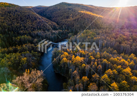 Drone view to autumn forest and small mountain river in the Far East of Russia 100376304