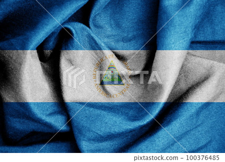 Flag texture on the silk background 100376485