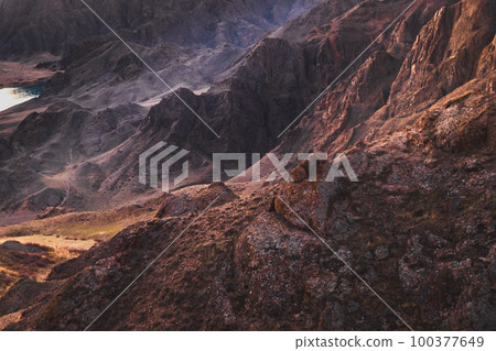 Rocky scenic landscape at dawn similar to the surface of the planet Mars Rocky scenic landscape at dawn similar to the surface of the planet Mars 100377649