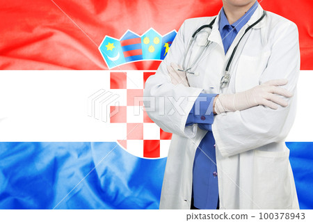 Doctor standing with the flag 100378943