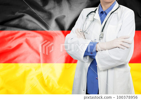 Doctor standing with the flag Doctor standing with the flag 100378956