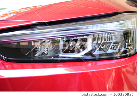 headlight of red car, transportation industry headlight of red car, transportation industry 100380985
