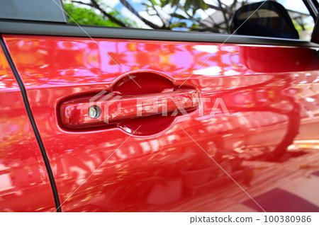 door handle of red car, transpotation industry door handle of red car, transpotation industry 100380986