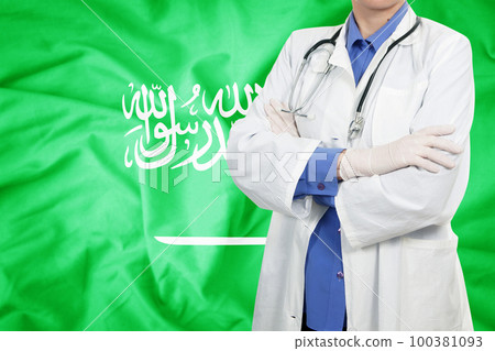 Doctor standing with the flag Doctor standing with the flag 100381093