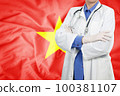 Doctor standing with the flag 100381107