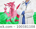 Doctor standing with the flag 100381108