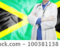 Doctor standing with the flag 100381138