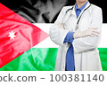Doctor standing with the flag 100381140