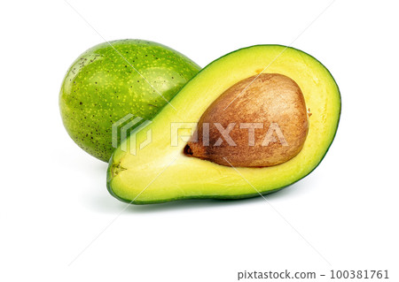 Whole avocado and half avocado isolated on white background. Whole avocado and half avocado isolated on white background. 100381761
