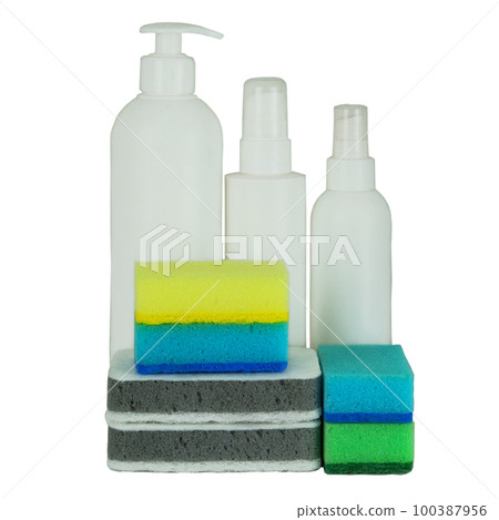 Detergents in spray. Cleaning accessories. Stack of cleaning sponges and bottle with a cleaning. Service concept. Detergents in spray. Cleaning accessories. Stack of cleaning sponges and bottle with a cleaning. Service concept. 100387956