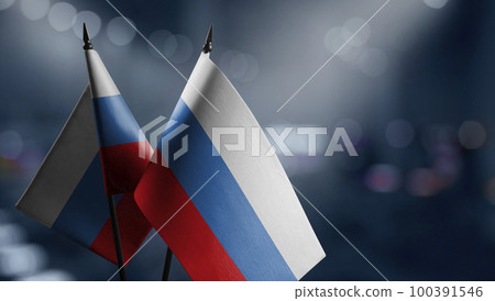 Small flags of the Russia on an abstract blurry background 100391546