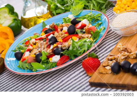 Rocket salad with ingredients 100392003
