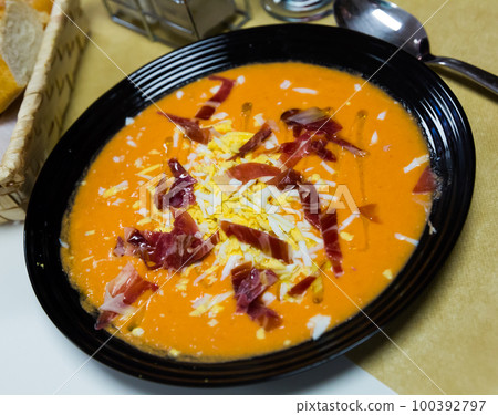 Salmorejo with jamon and boiled egg Salmorejo with jamon and boiled egg 100392797